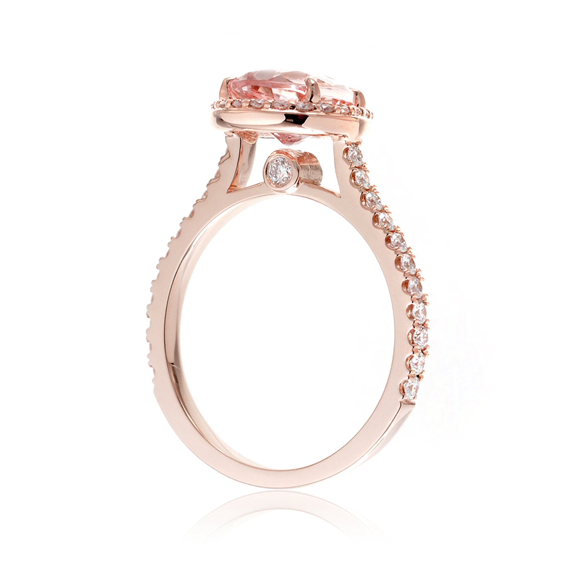 Pear cut morganite ring with diamond halo and band in the Sunset rose gold