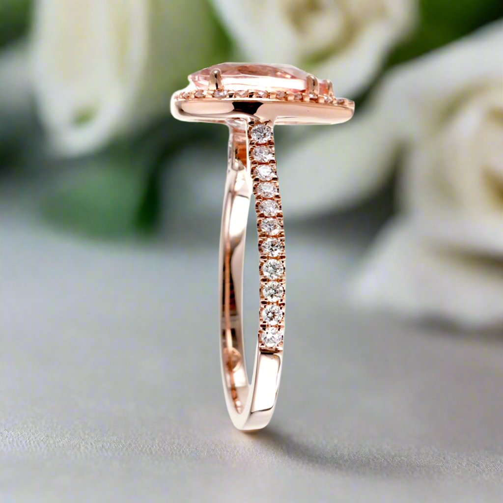 Pear cut morganite ring with diamond halo and band in the Sunset rose gold