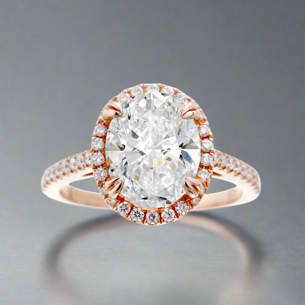 Oval diamond ring with halo in rose gold