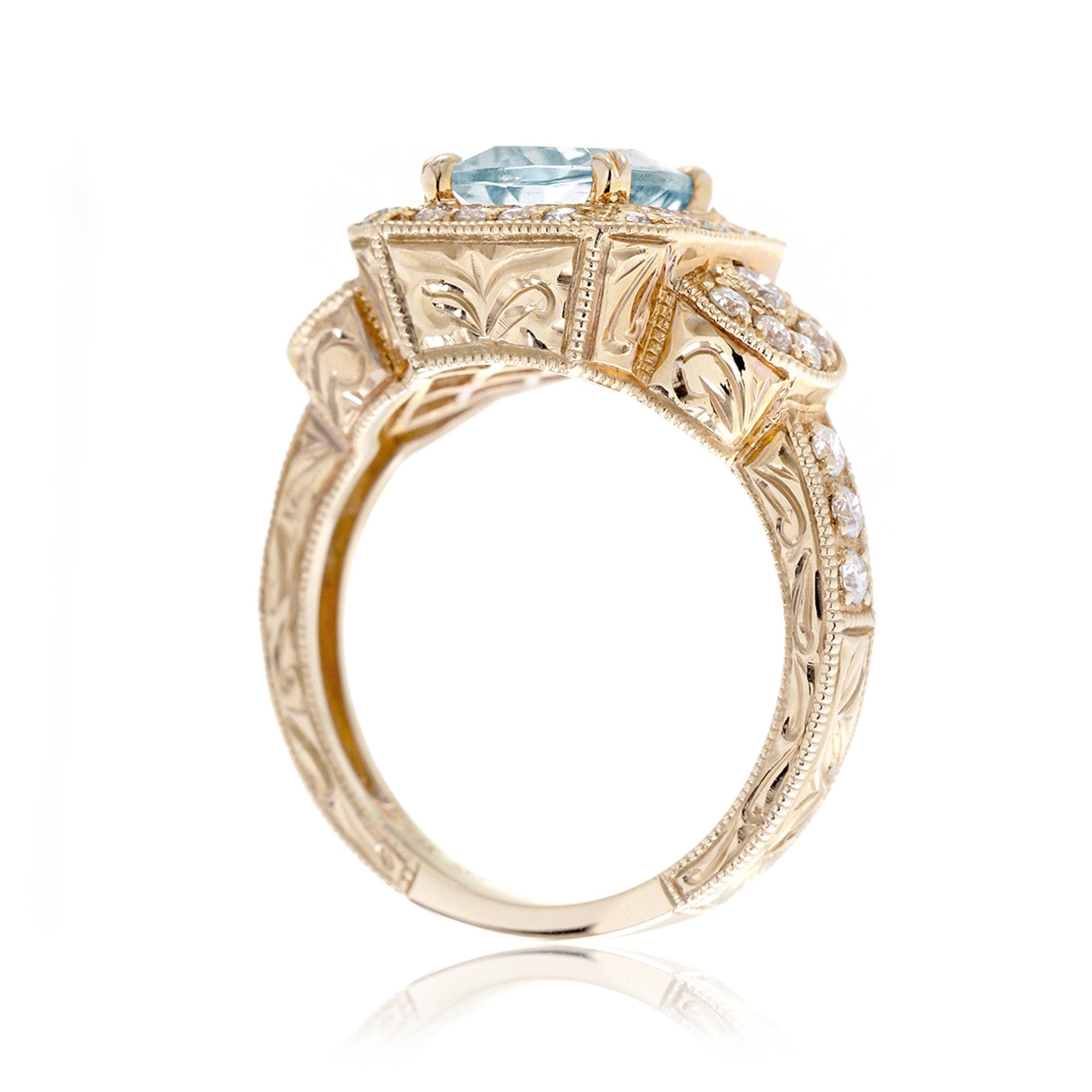 Cushion cut aquamarine vintage antique style three stone diamond halo ring yellow gold