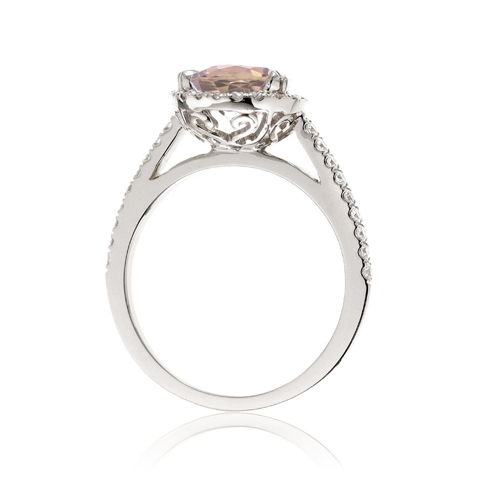 Oval morganite engagement ring with diamond halo in white gold