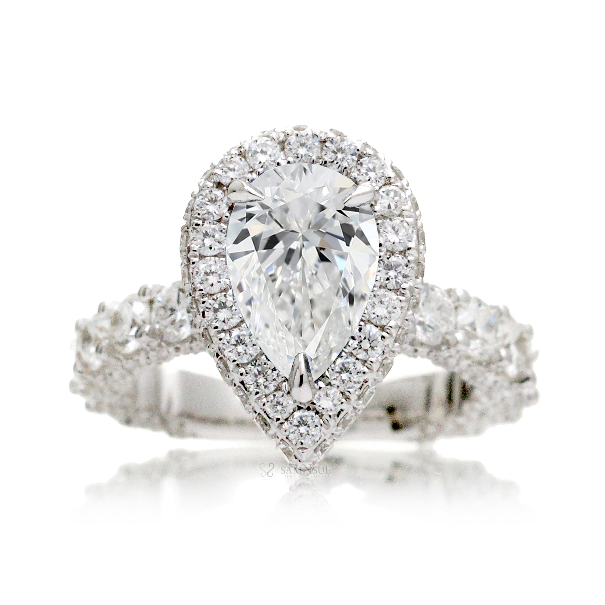 Pear diamond ring with two sided halo and u prong band