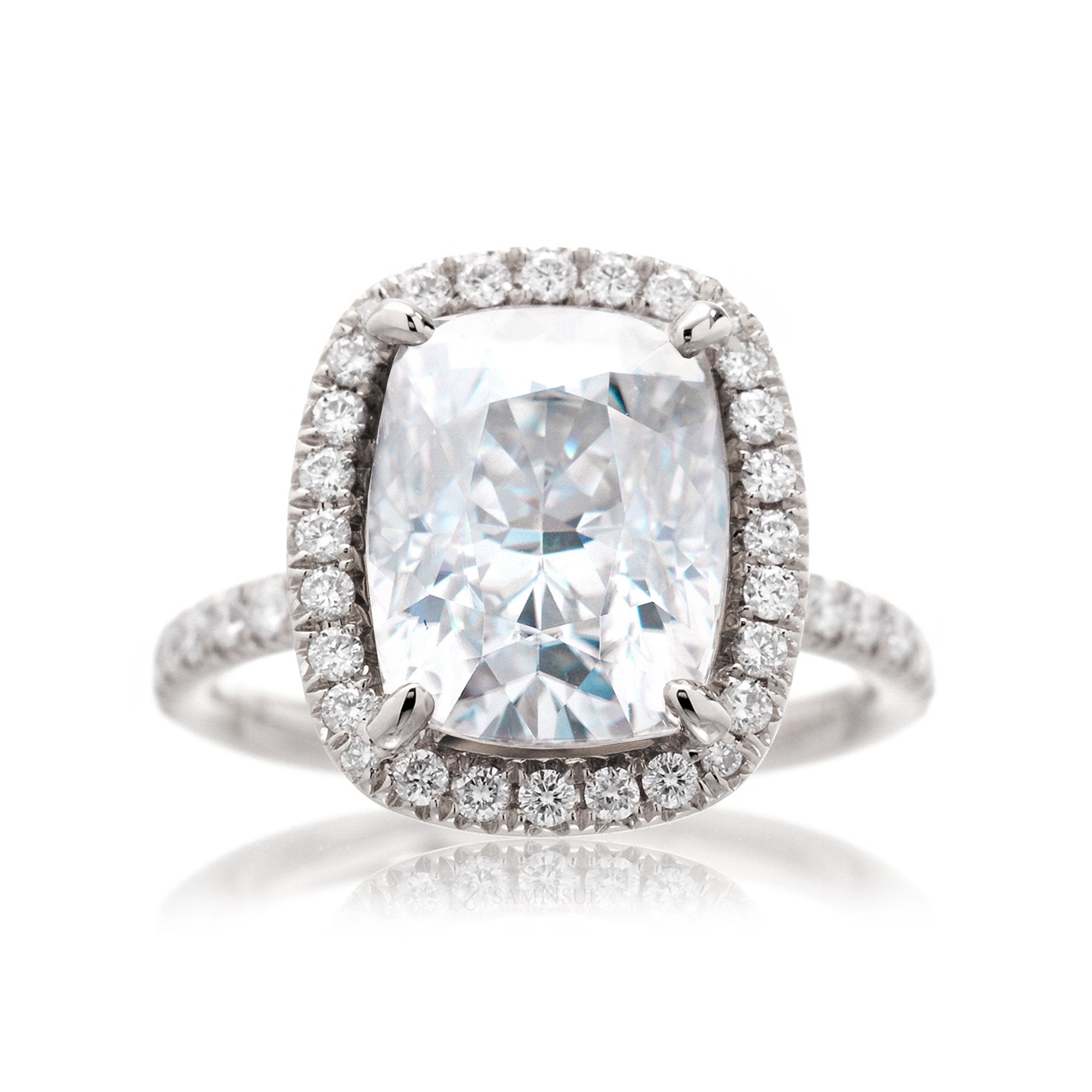 Cushion moissanite and diamond halo ring with a diamond band in white gold - the drenched