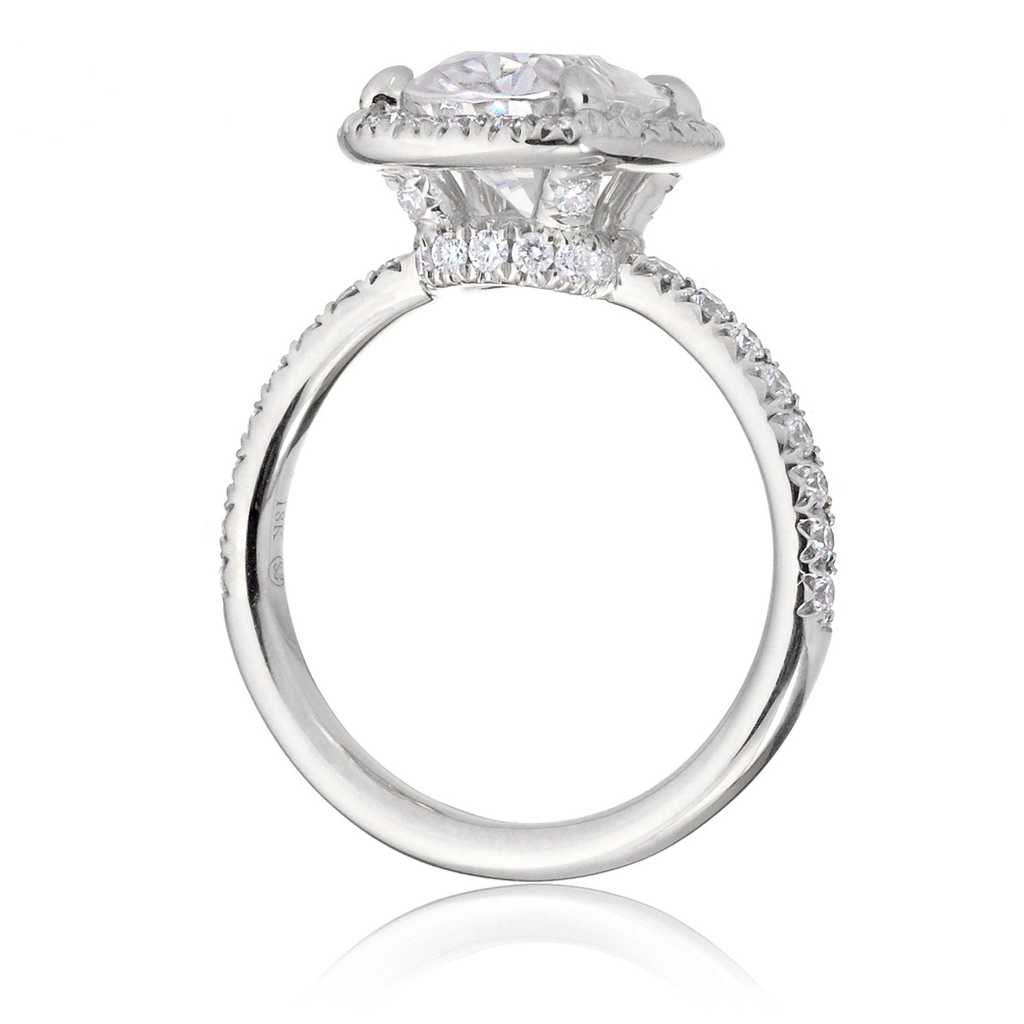 Cushion moissanite and diamond halo ring with a diamond band in white gold - the drenched