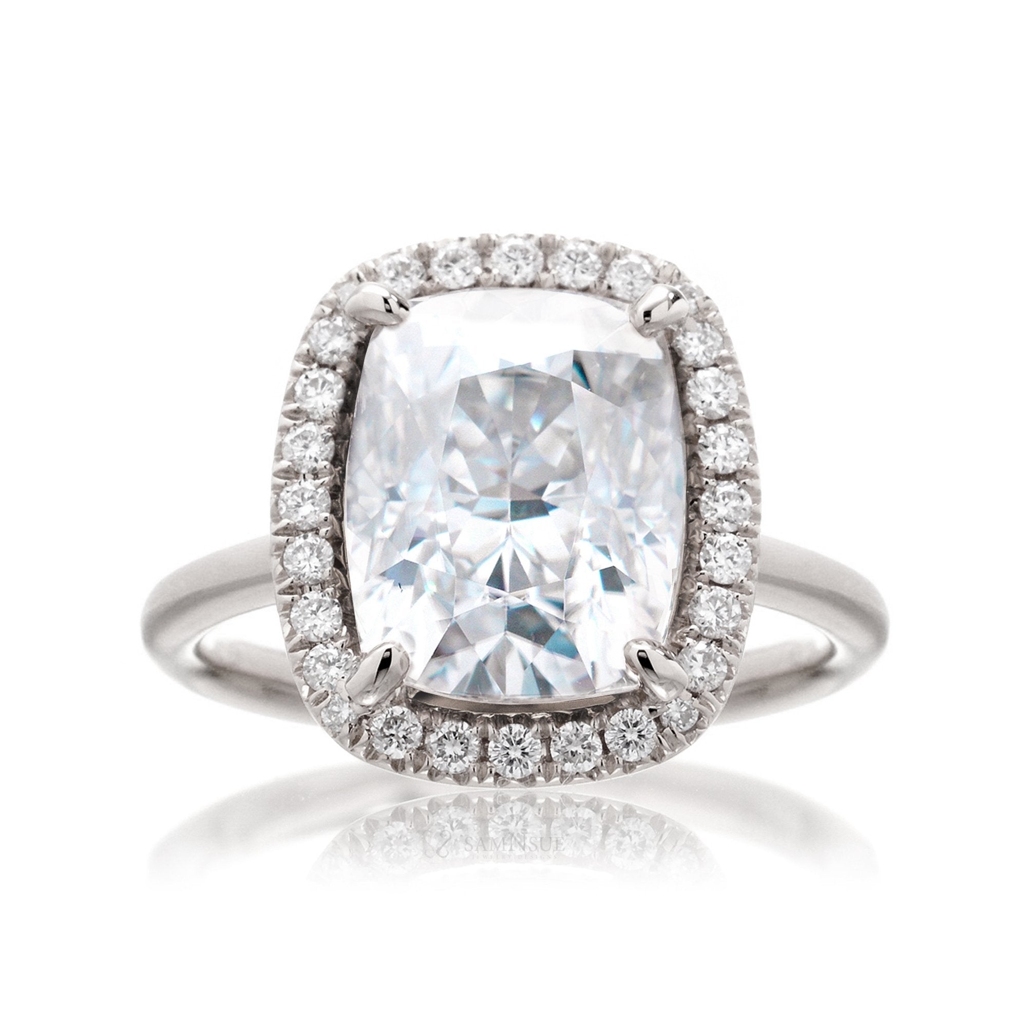 Cushion moissanite and diamond halo ring with a solid band in white gold - the drenched