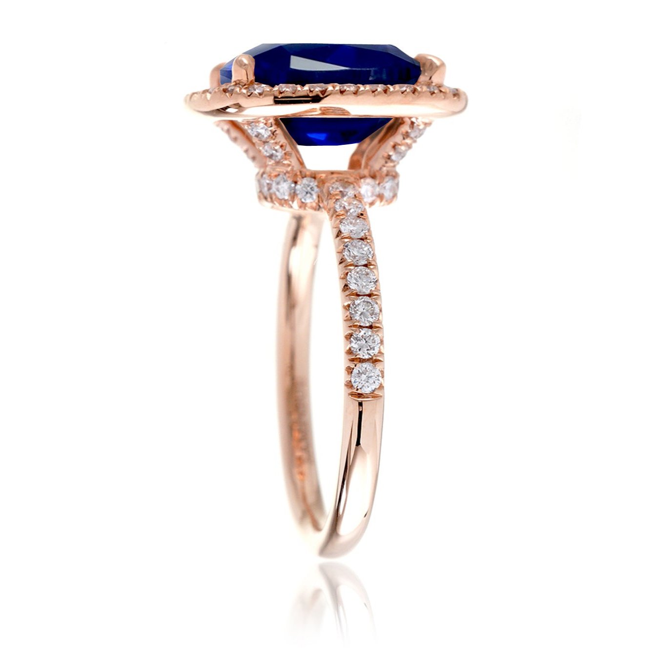 Blue sapphire ring with diamond halo The Drenched engagement rose gold profile view