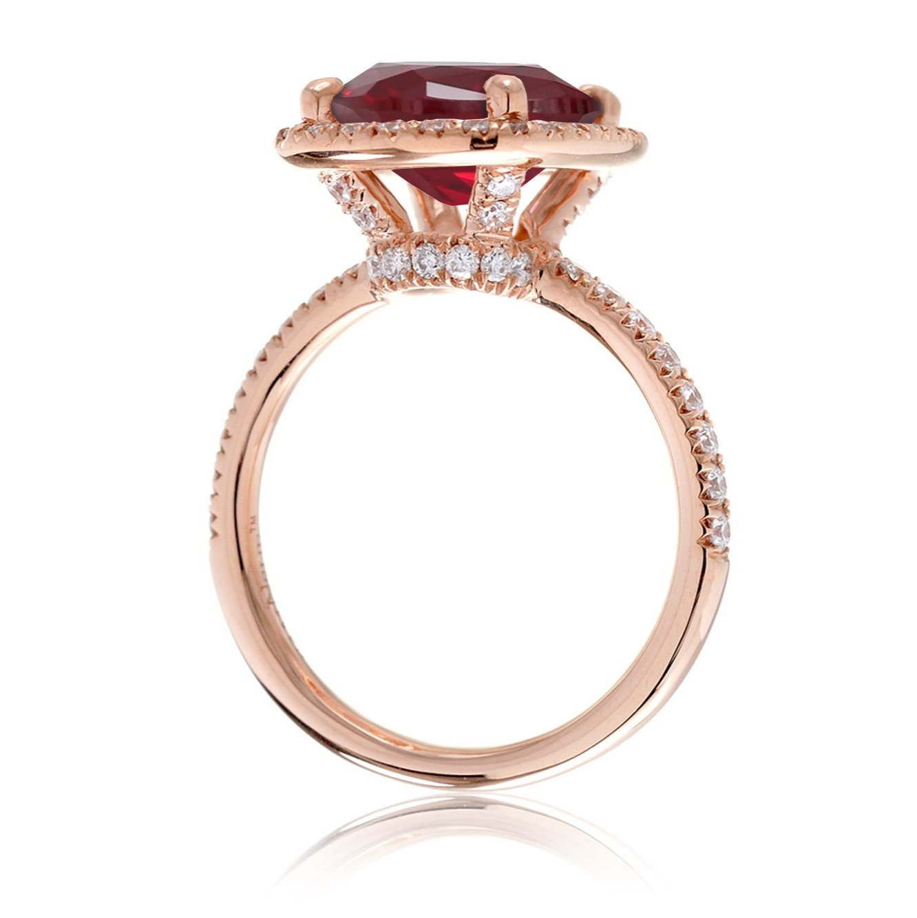 Ruby engagement ring with diamond halo The Drenched Cushion rose gold side view