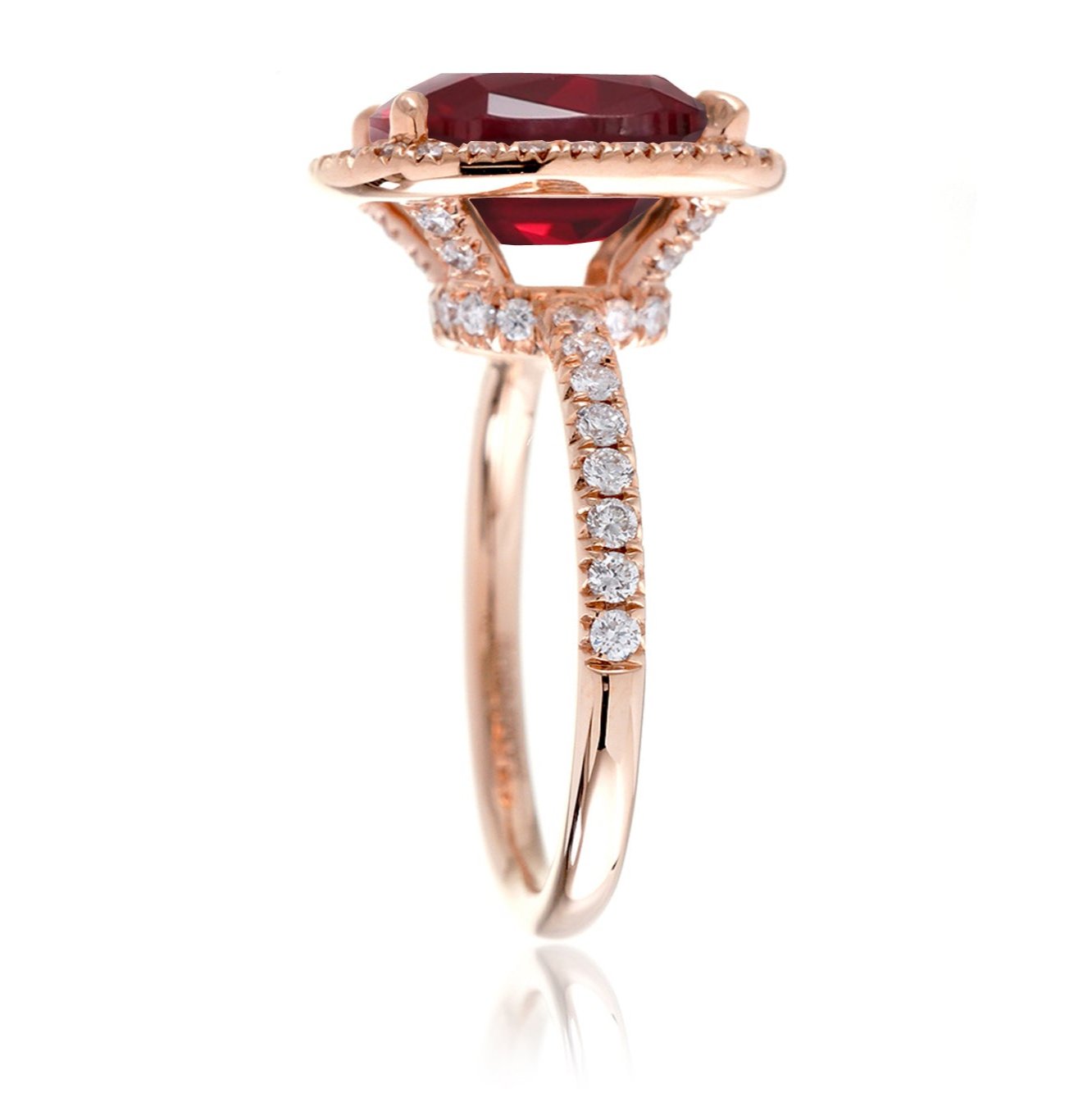 Ruby engagement ring with diamond halo The Drenched Cushion rose gold profile view