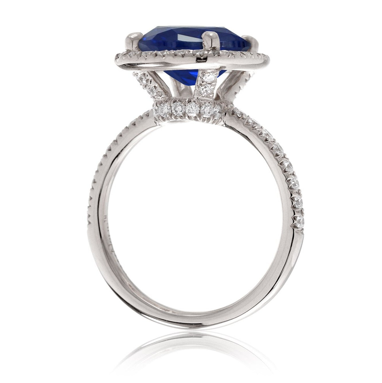 Blue sapphire ring with diamond halo The Drenched engagement white gold side view