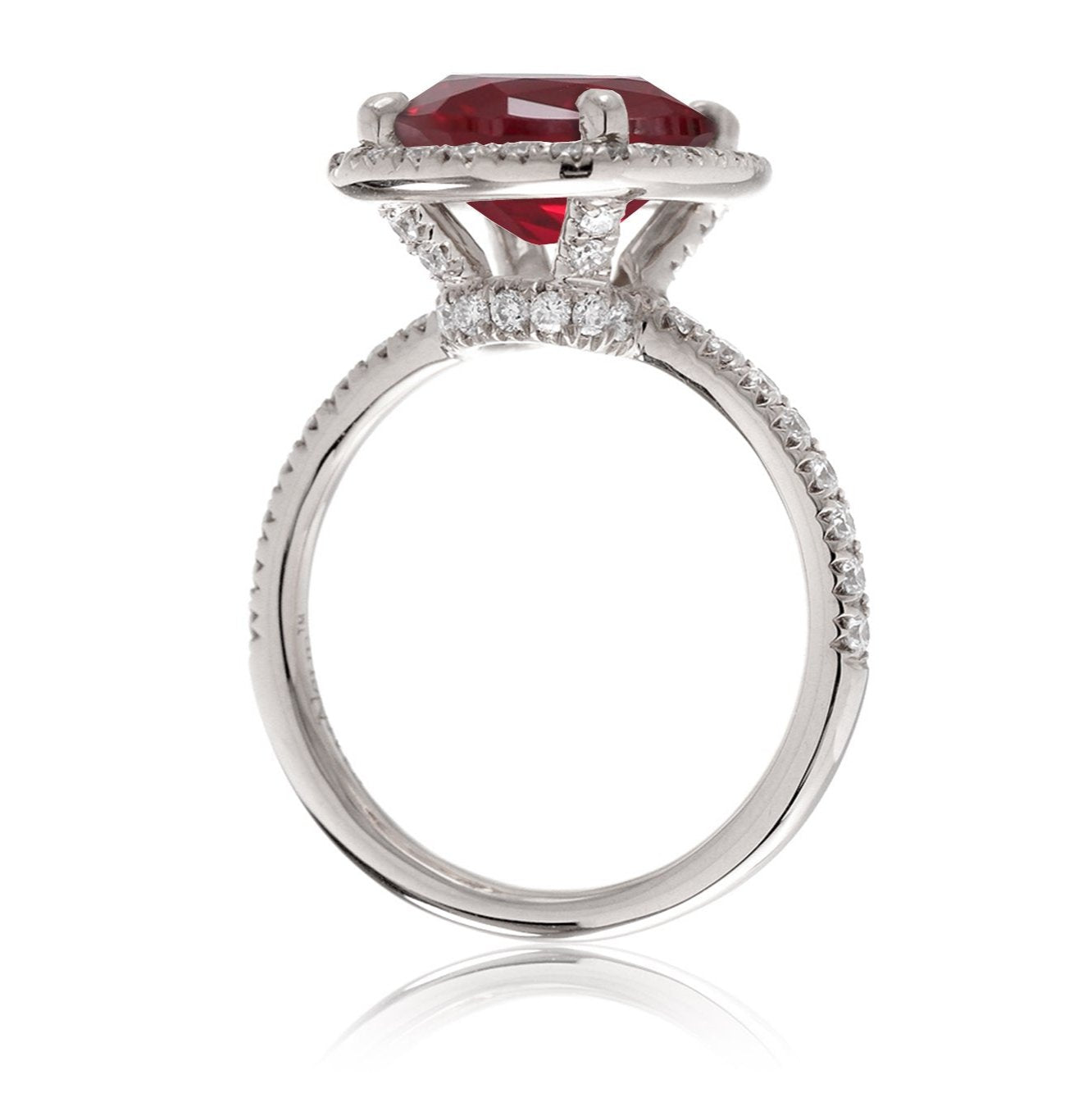 Ruby engagement ring with diamond halo The Drenched Cushion white gold side view