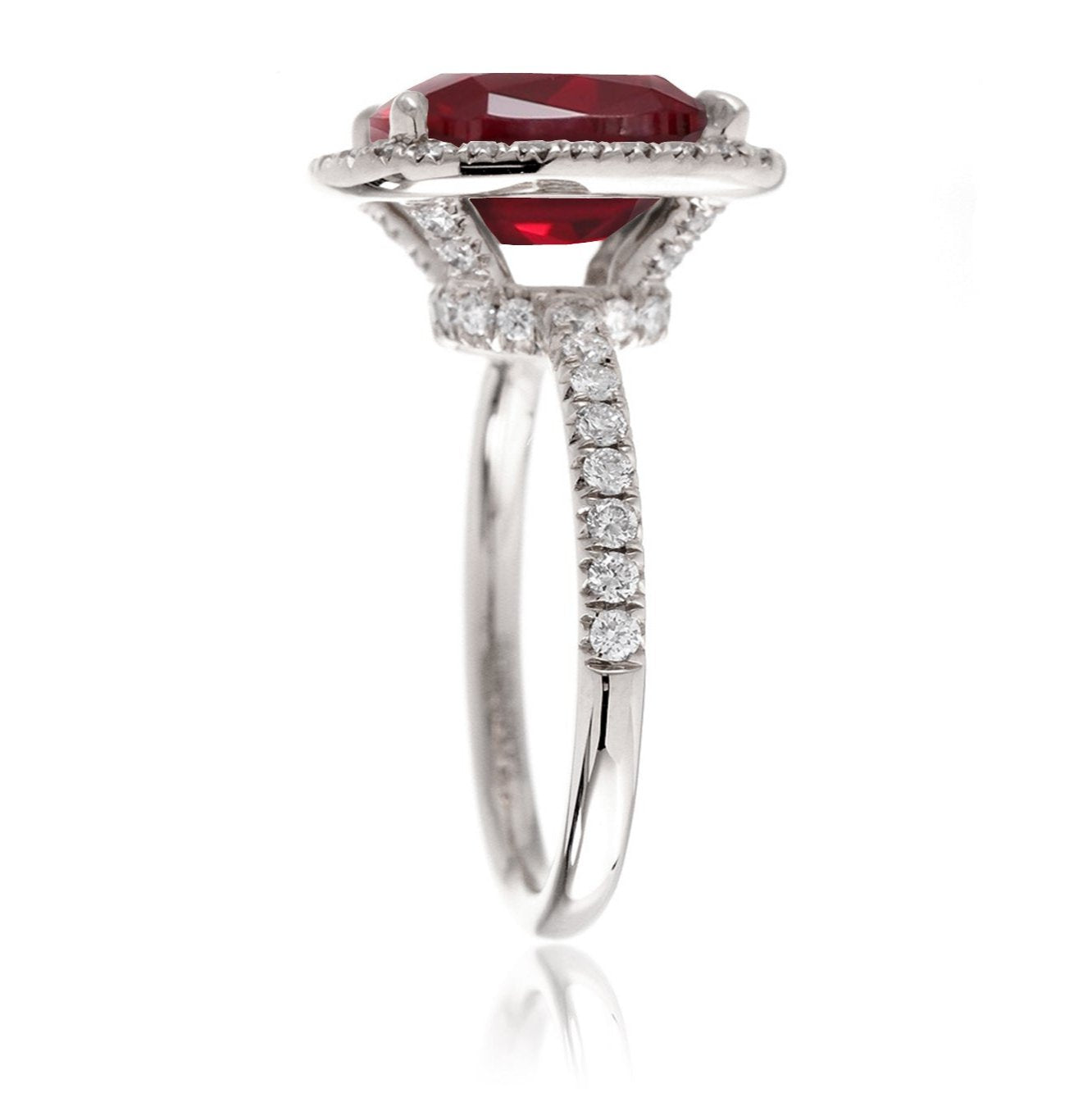 Ruby engagement ring with diamond halo The Drenched Cushion white gold