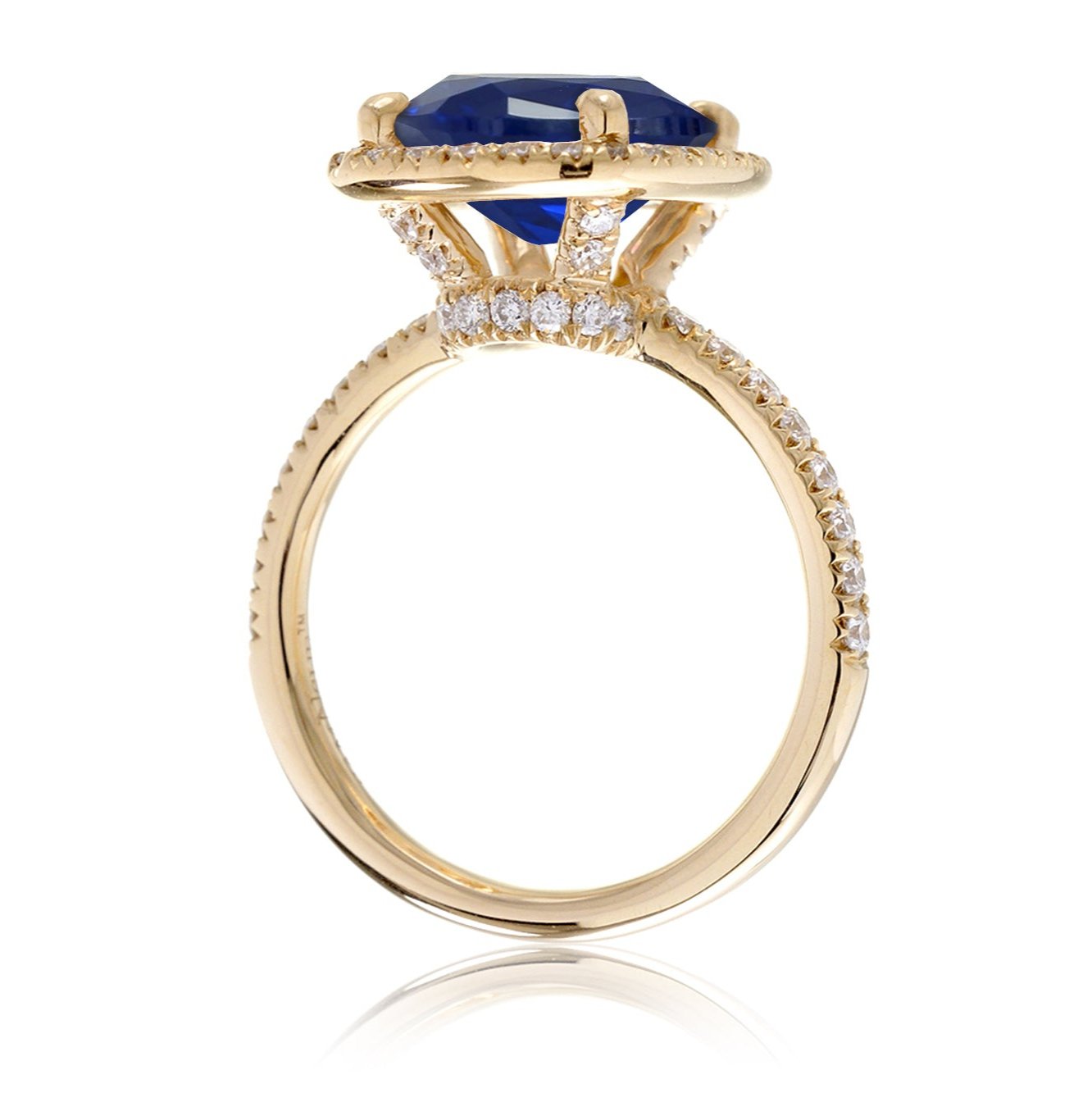 Blue sapphire ring with diamond halo The Drenched engagement yellow gold side view