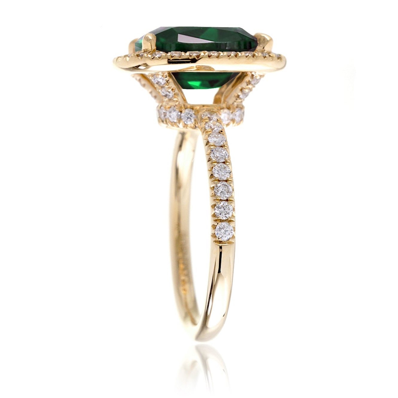 Green emerald engagement ring with emerald cut center stone diamond halo the Drenched yellow gold