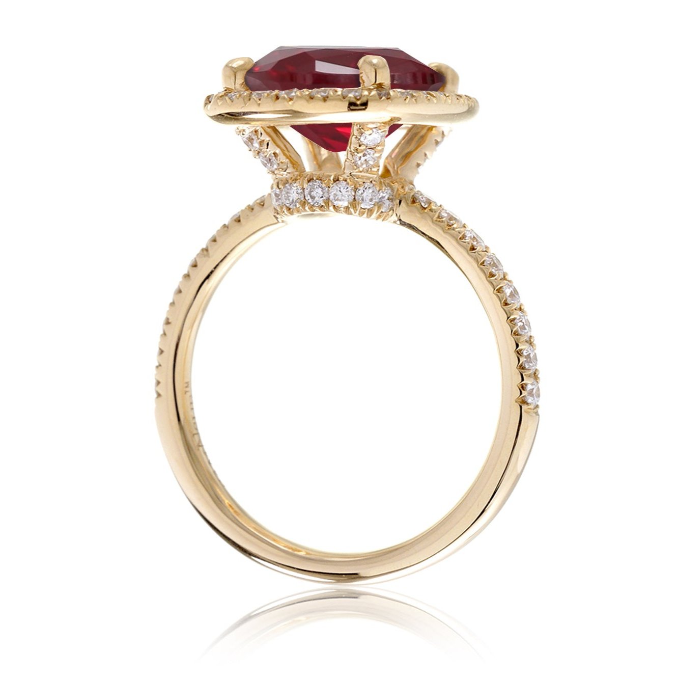 Ruby engagement ring with diamond halo The Drenched Cushion yellow gold side view