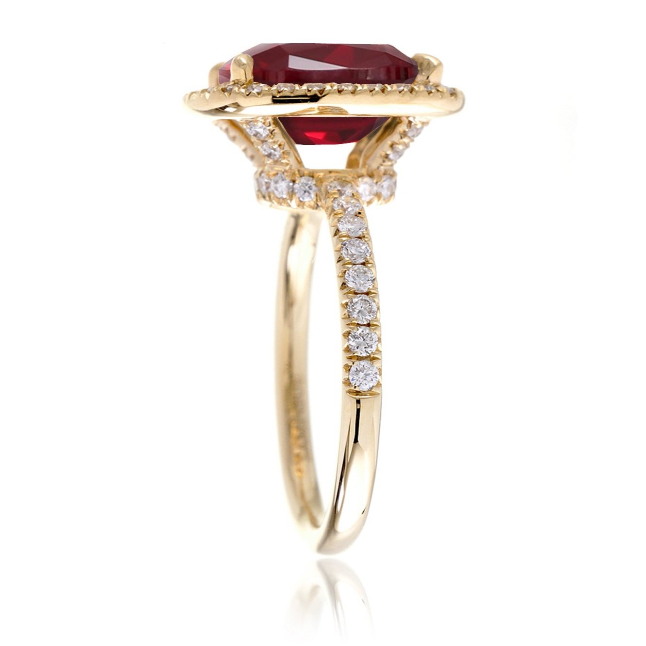 Ruby engagement ring with diamond halo The Drenched Cushion yellow gold profile view