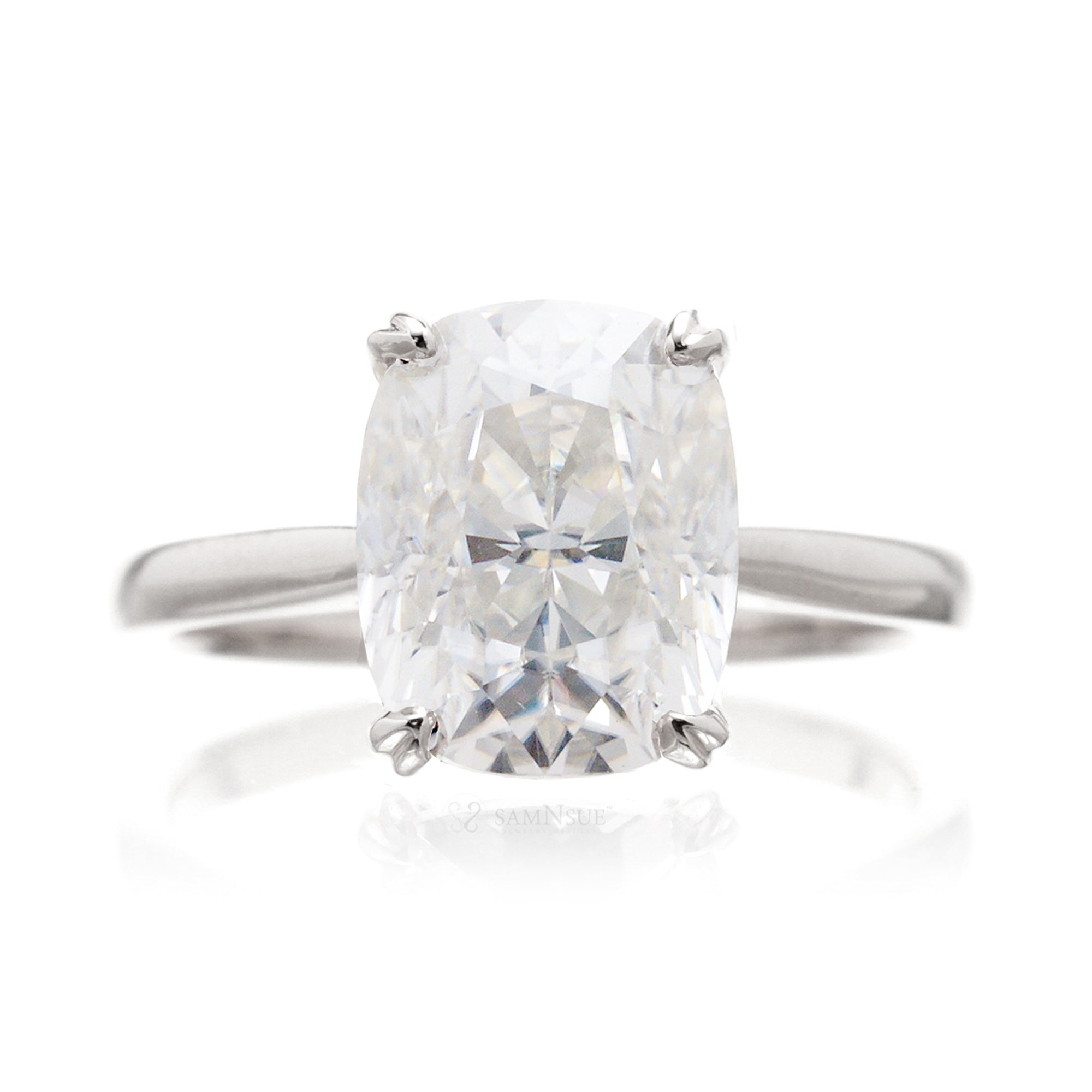 Cushion moissanite solitaire engagement ring in white gold and solid band
