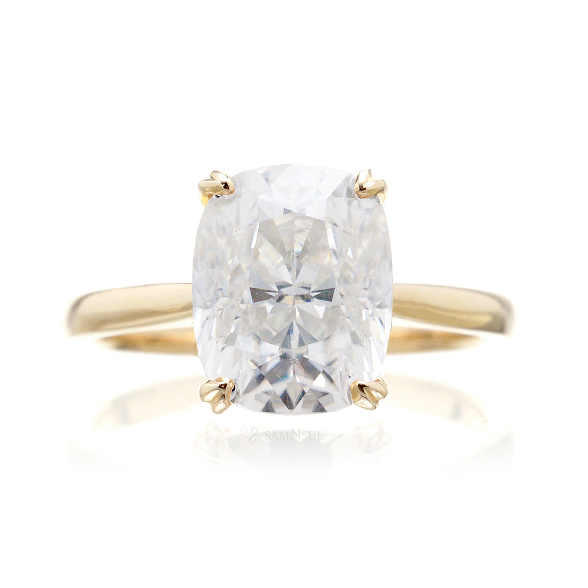 Cushion moissanite solitaire engagement ring in yellow gold and solid band