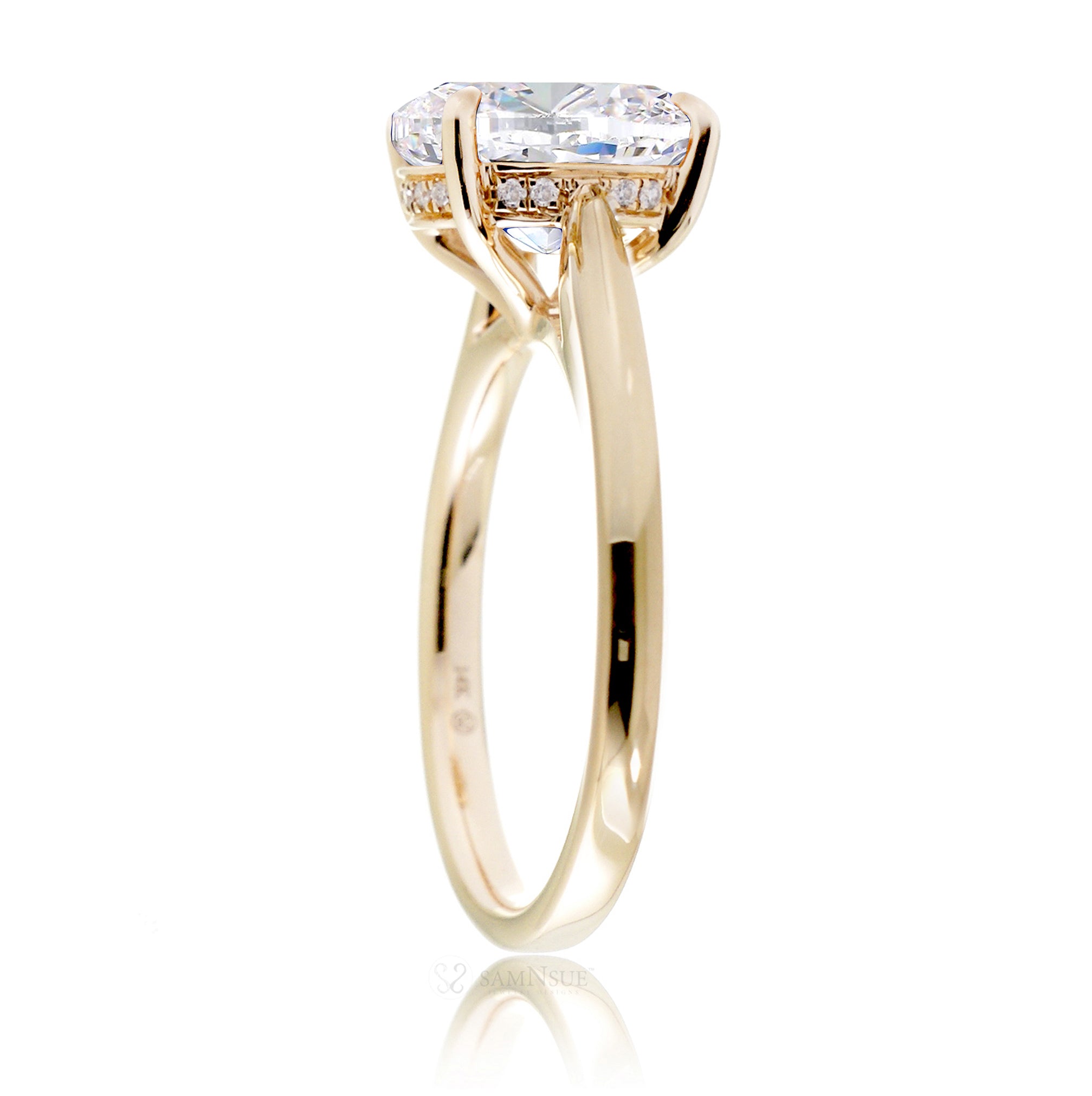 Cushion moissanite solitaire engagement ring in yellow gold and solid band