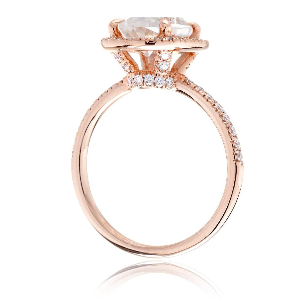 Oval moissanite cut engagement ring with diamond halo the Drenched rose gold side view