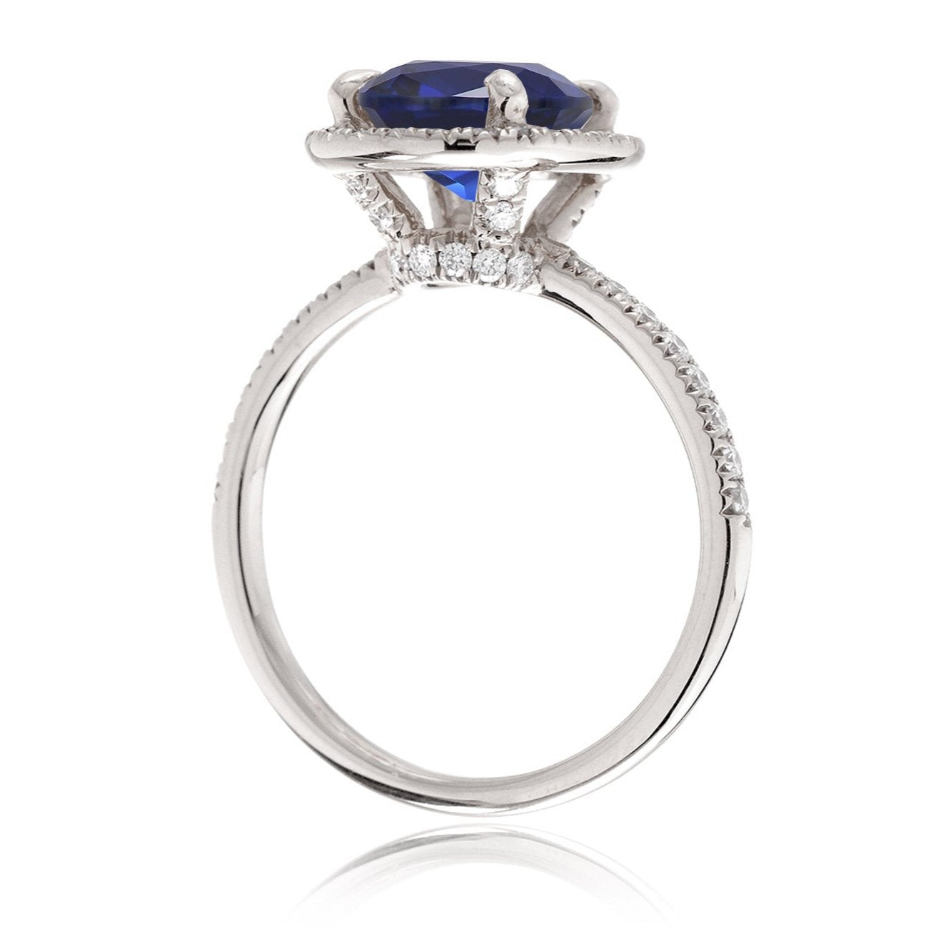 Oval sapphire diamond halo and band wedding rings white gold side view