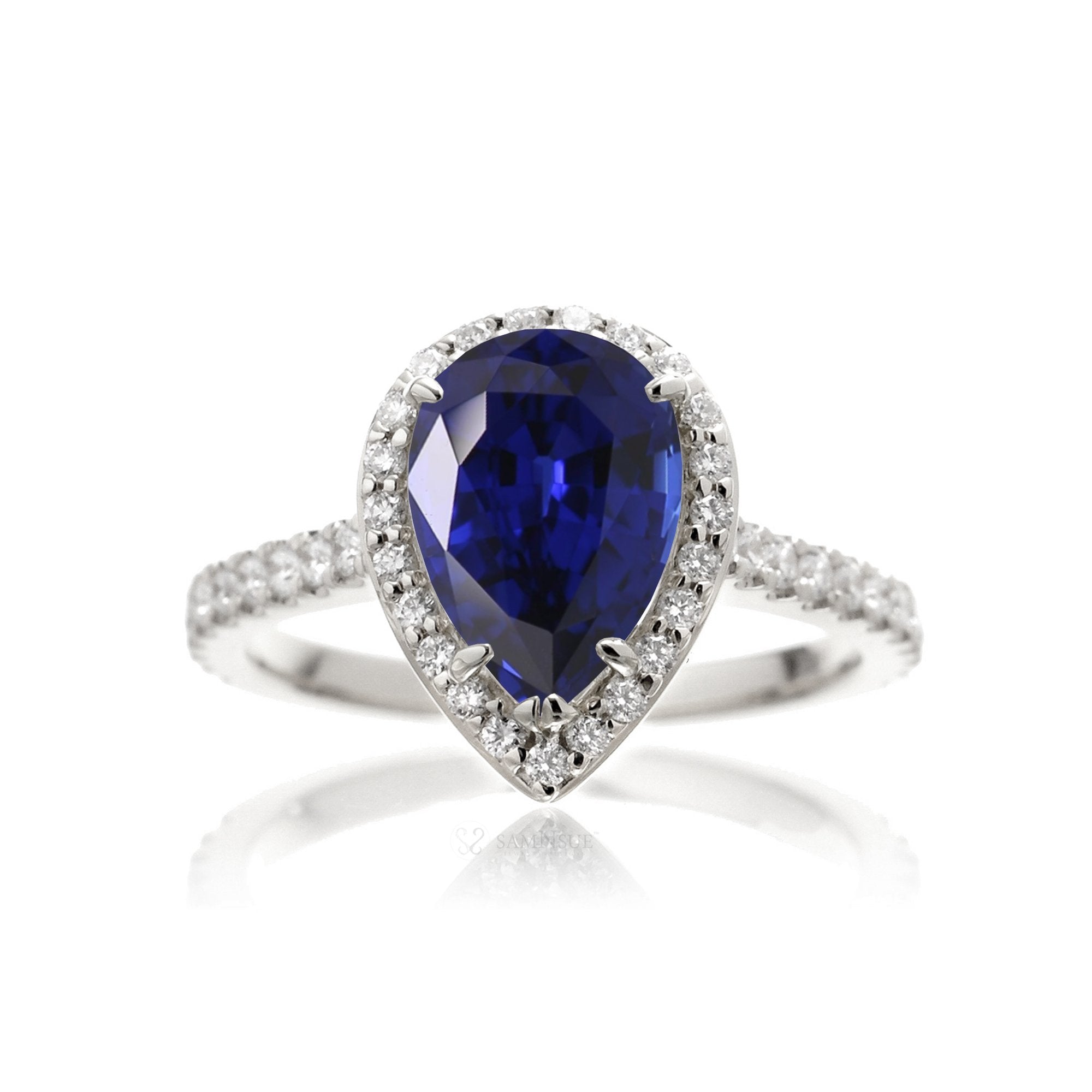 Woman Sapphire Engagement Ring | Pear Shape Diamond Halo | The Sunset