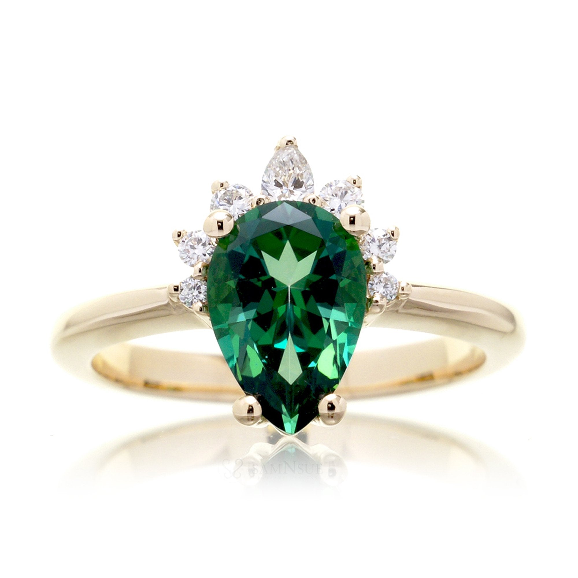 Green pear emerald half diamond halo ring - the Pacey yellow gold