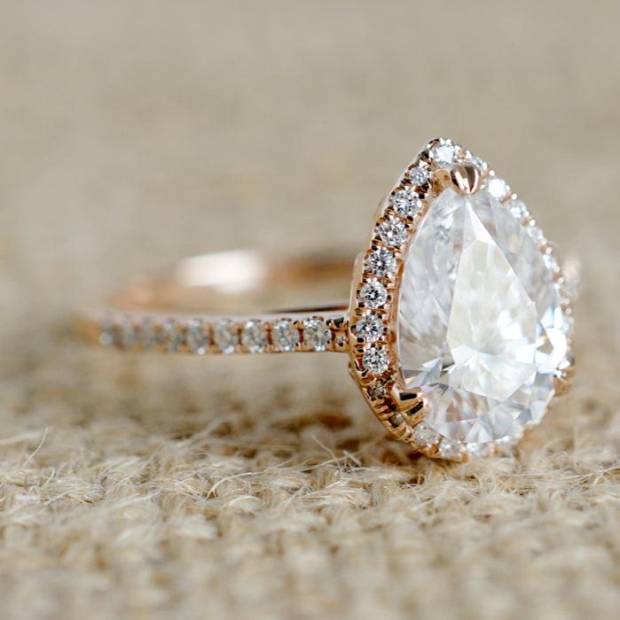 Pear diamond ring with halo